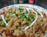 A picture of step 14 of Tikka macroni.