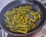 A picture of step 2 of Masala bhindi.