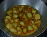 A picture of step 9 of Dum Aloo.