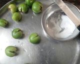 A picture of step 1 of Gum berry (gunda) and raw mango sabji.