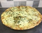 Une image de l'étape 3 de Pizza poulet curry et savoyarde 🍕.