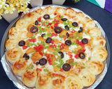A picture of step 6 of Cheesy Bites Chicken Tikka Pizza 🍕🧀🍕🧀🍕.