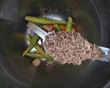 A picture of step 1 of Green Lentil-Onion Fritters (Chilkewali Moong Dal Pakodas).