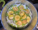Foto del paso 5 de la receta: Hervido de Alcachofa con Guisantes y Cebolla Tierna