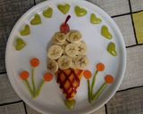A picture of step 5 of Fruit chaat in tree style.