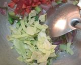 A picture of step 3 of Leftover fried rice in cabbage cups.