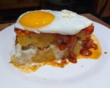 Foto del paso 4 de la receta: Pastel de polenta con bolognesa, queso, tuco y a caballo