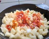 A picture of step 2 of Garlic potato fry.