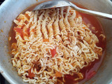 Fried Indomie with Kienyeji eggs