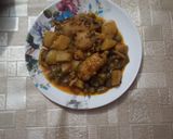 A picture of step 8 of ALU Matar Chicken.