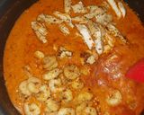 A picture of step 13 of Tuscan Chicken & Shrimp pasta.