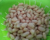 Foto del paso 1 de la receta: Ensalada templada de alubias blancas, espinacas y naranja