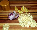 A picture of step 3 of Mike's 40 Clove Baked Garlic Stuffed Game Hens & Veggies.
