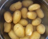 A picture of step 3 of Hasselback truffle roasted potatoes.