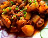 A picture of step 16 of Khatay aloo.