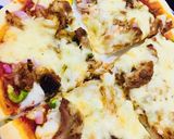 A picture of step 4 of Creamy Tikka pizza.