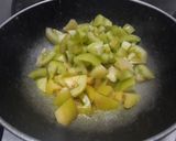 A picture of step 2 of Green Tomato Ki Khatti Meethi Sabji.