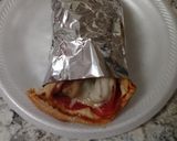 A picture of step 8 of Pepperoni pizza pita wrap.
