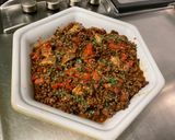 Une image de l'étape 11 de Lentilles brunes aux poivrons rouges et lard fumé.