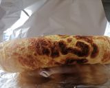 Foto del paso 2 de la receta: Rulo de tortilla relleno de queso y pavo con verdura salteada