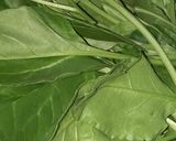A picture of step 3 of Roti bread spinach sandwich.