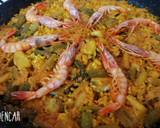 Foto del paso 7 de la receta: Arroz con bacalao, gambas y ajos tiernos
