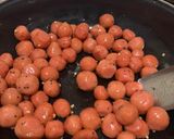 A picture of step 6 of Beetroot Mani Kozhakkattai.