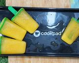 A picture of step 4 of Orange popsicles.
