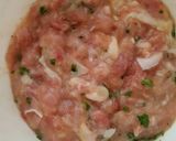 A picture of step 2 of Chicken momo (Indian/Nepali art).