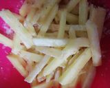 A picture of step 4 of Masala fries.