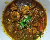 A picture of step 2 of Prawn curry with raw mango.