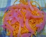 Foto del paso 2 de la receta: Rúcula, zanahoria, cebolla morada en ensalada