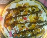 A picture of step 5 of Choco Fruity Creamy pizza.