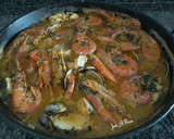 Foto del paso 10 de la receta: Caldero de merluza con almejas y gambones