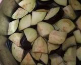 A picture of step 1 of Aaloo baingan (potato-brinjal).