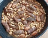 Foto del paso 18 de la receta: Cazuela de butifarra y calamarcitos con conchas