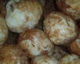 A picture of step 3 of Fried coated egg.