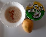 A picture of step 1 of Oats Mango Smoothie.