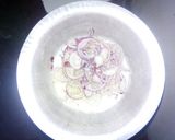 A picture of step 2 of Indomie with rice.
