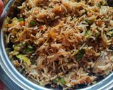 A picture of step 5 of Triple Schezwan fried rice.