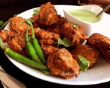 A picture of step 4 of Parwal (Pointed Gourd) Peel Pakora / Fritters.