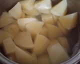 A picture of step 1 of Masaledaar Khattey aloo.