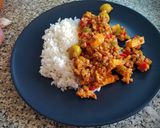 A picture of step 11 of Cuban-Style Picadillo.