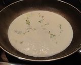 A picture of step 4 of Pork Chops Cooked in Milk and Herbs.