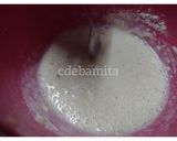 A picture of step 2 of Orange Kulfi in orange shell.