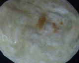 A picture of step 3 of Puri paratha in tawa style.