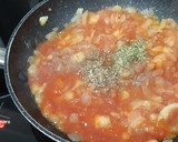Foto del paso 3 de la receta: Calabacín relleno de bacalao con tomate