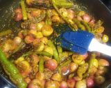 A picture of step 9 of Karonda pickle.