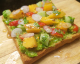 A picture of step 2 of Mango Guacamole Toast.