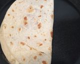 A picture of step 3 of Speck, brie and red onion piadina.
